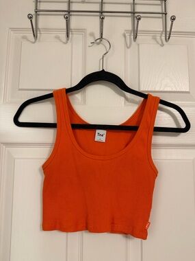 TNA Bright Orange Ribbed Crop Tank